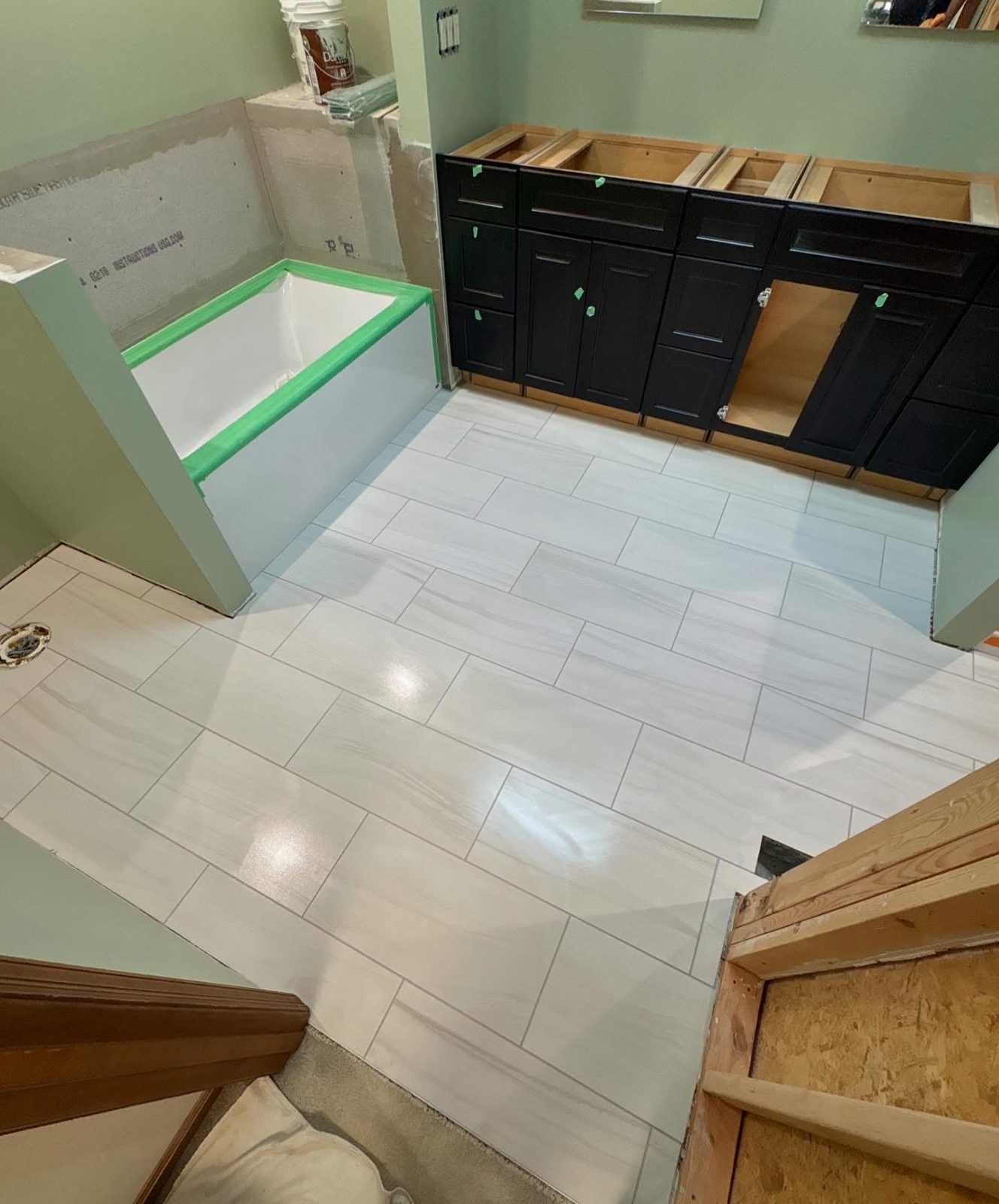 White porcelain tile bathroom floor installed in a Dayton, OH home