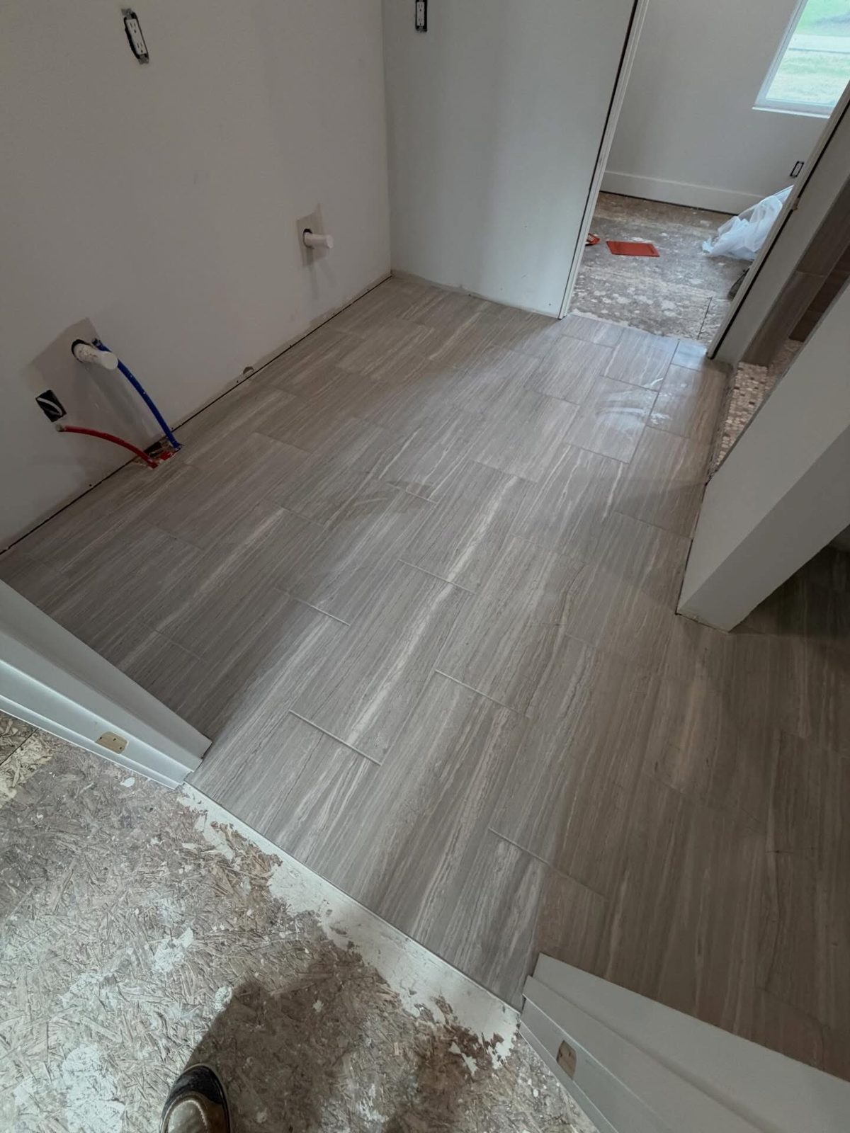Wood-look plank tile floor installed in a Kettering, OH kitchen