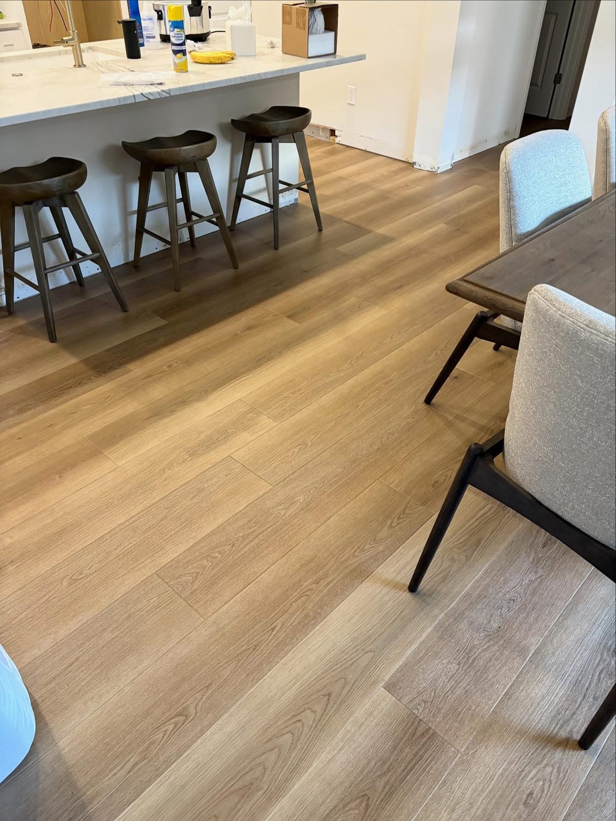 LVP flooring in a Centerville, OH kitchen and dining area with counter seating