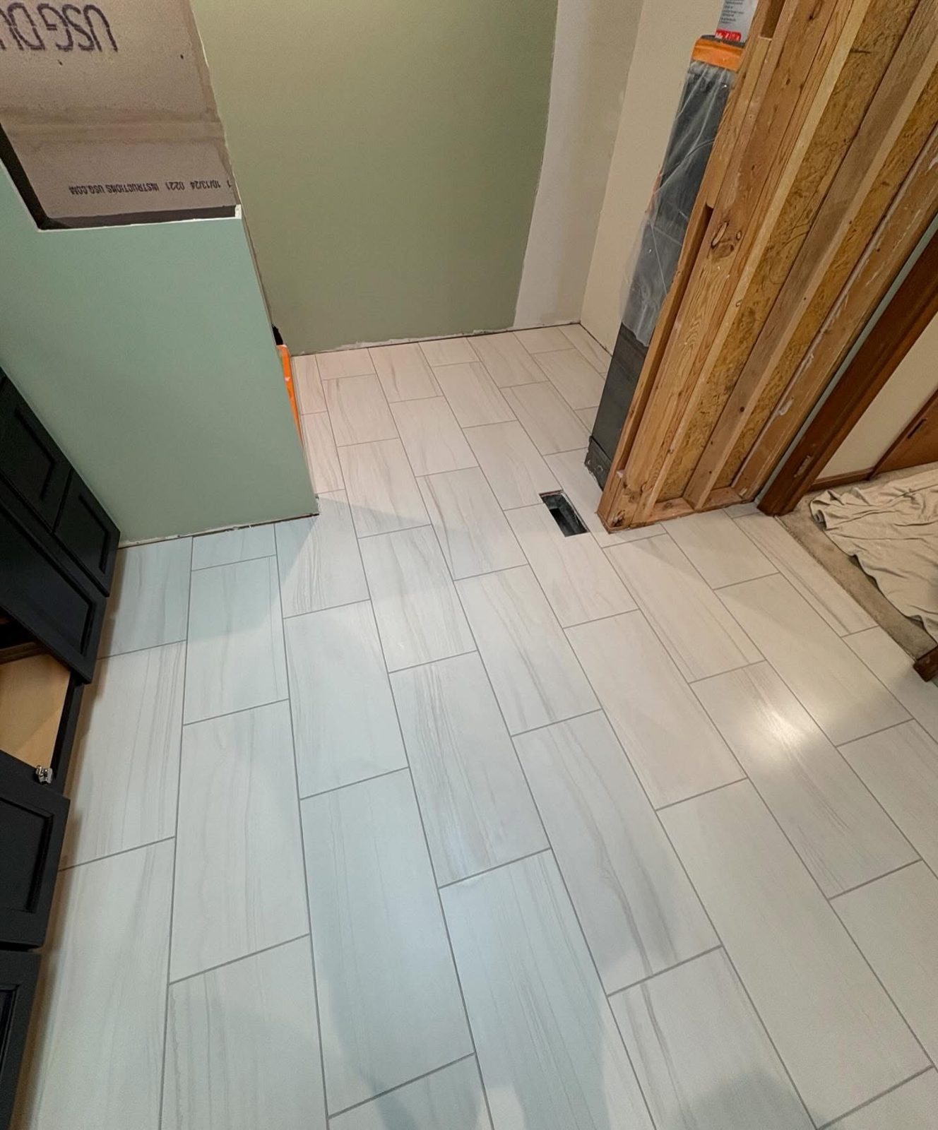 Wood-look tile floor installed in a Dayton, OH home